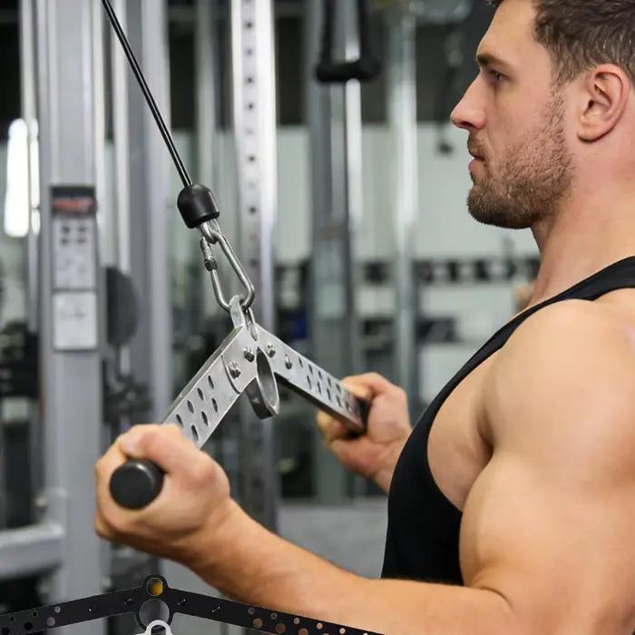 Barre de traction latérale pour machine à câbles en acier