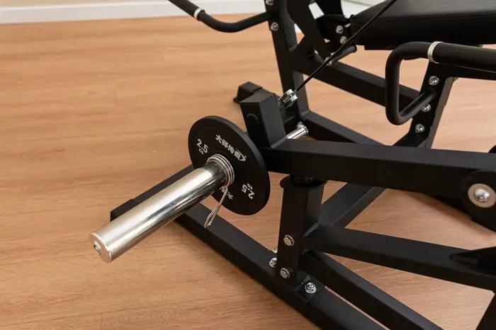Appareil de musculation combiné pour extensions et curls assis à charge libre