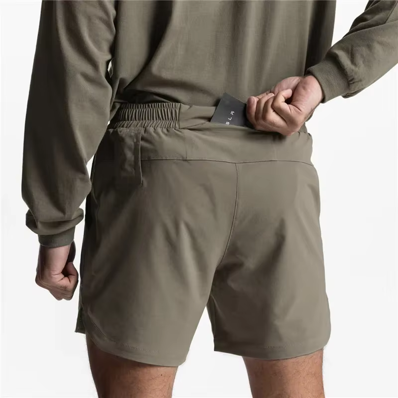 Nouveaux hommes course séchage rapide Fitness gymnases Shorts hommes été pantalons courts mâle survê