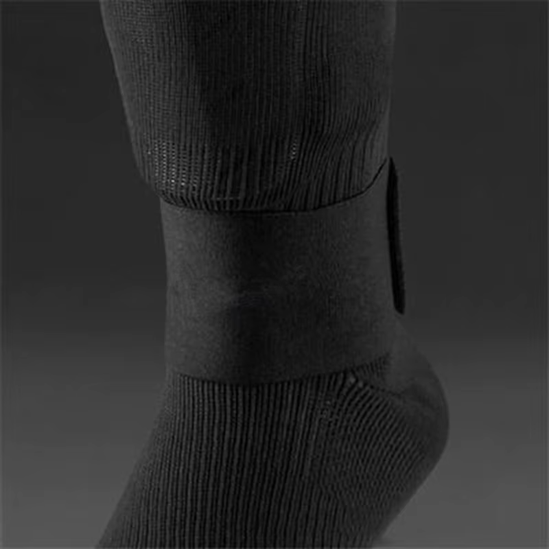 Nouveau protège-tibia ruban de pansement fixe protège-tibia de football prévenir la chute élastique